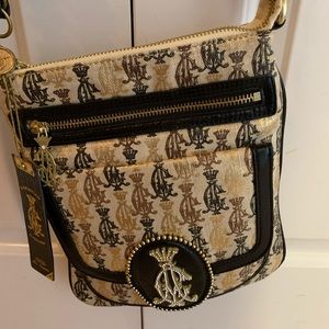 Christian Audigier purse. Brand new.